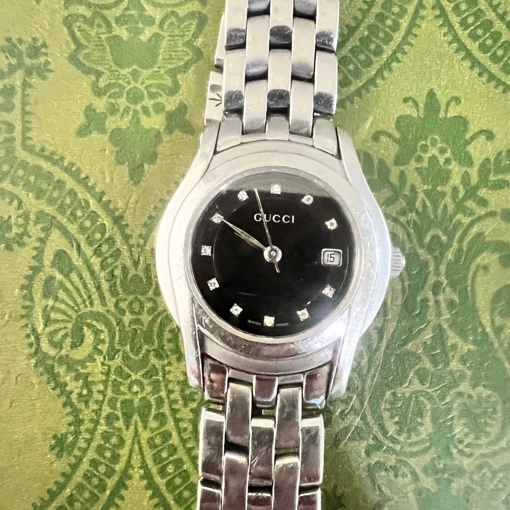 Gucci 5500L Diamond Stainless Steel Ladies Watch. New battery. Works well.